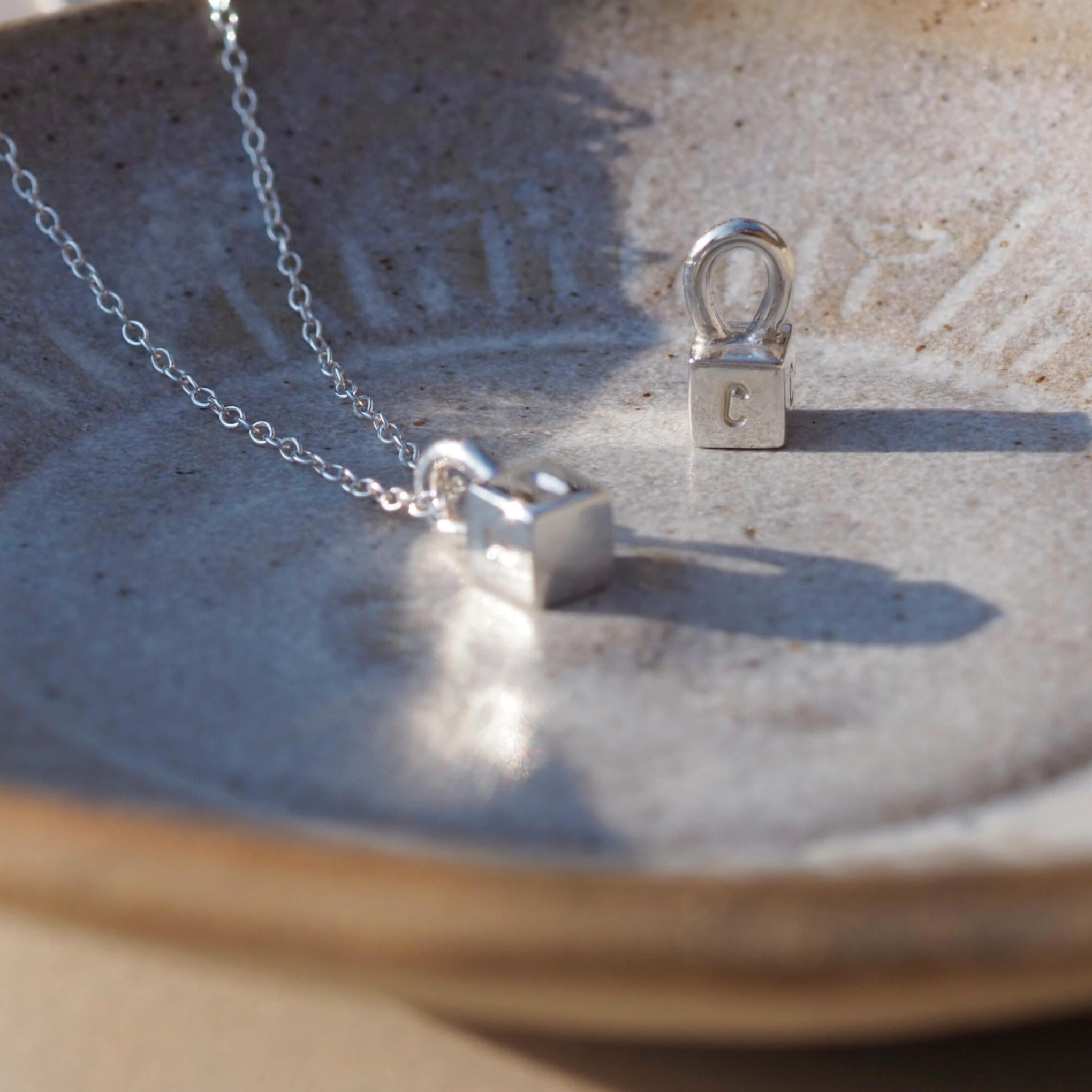 Silver dainty cube necklace, personalised with hand-stamped initials for a unique gift