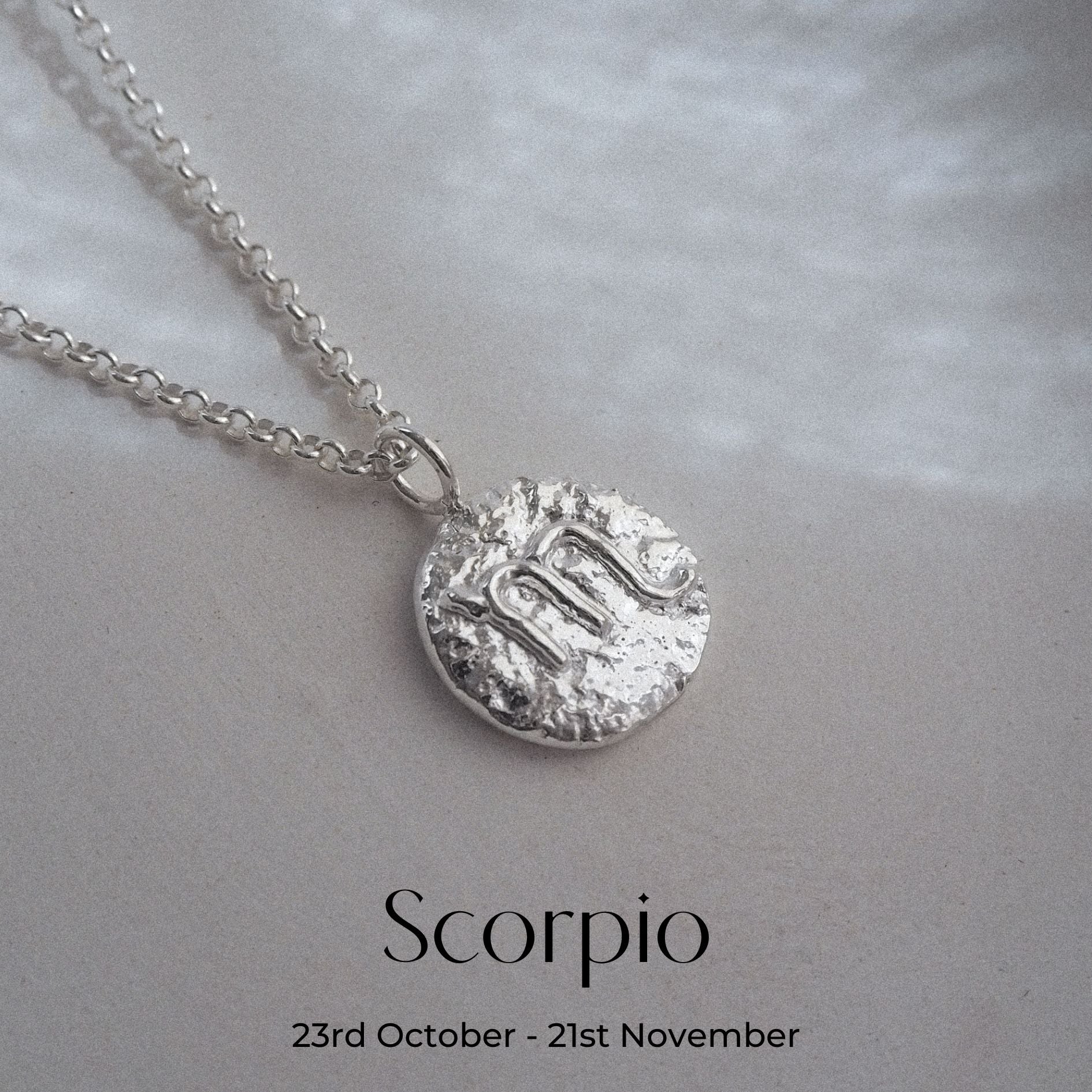 Hand-forged molten Scorpio Necklace in Sterling Silver on a belcher chain
