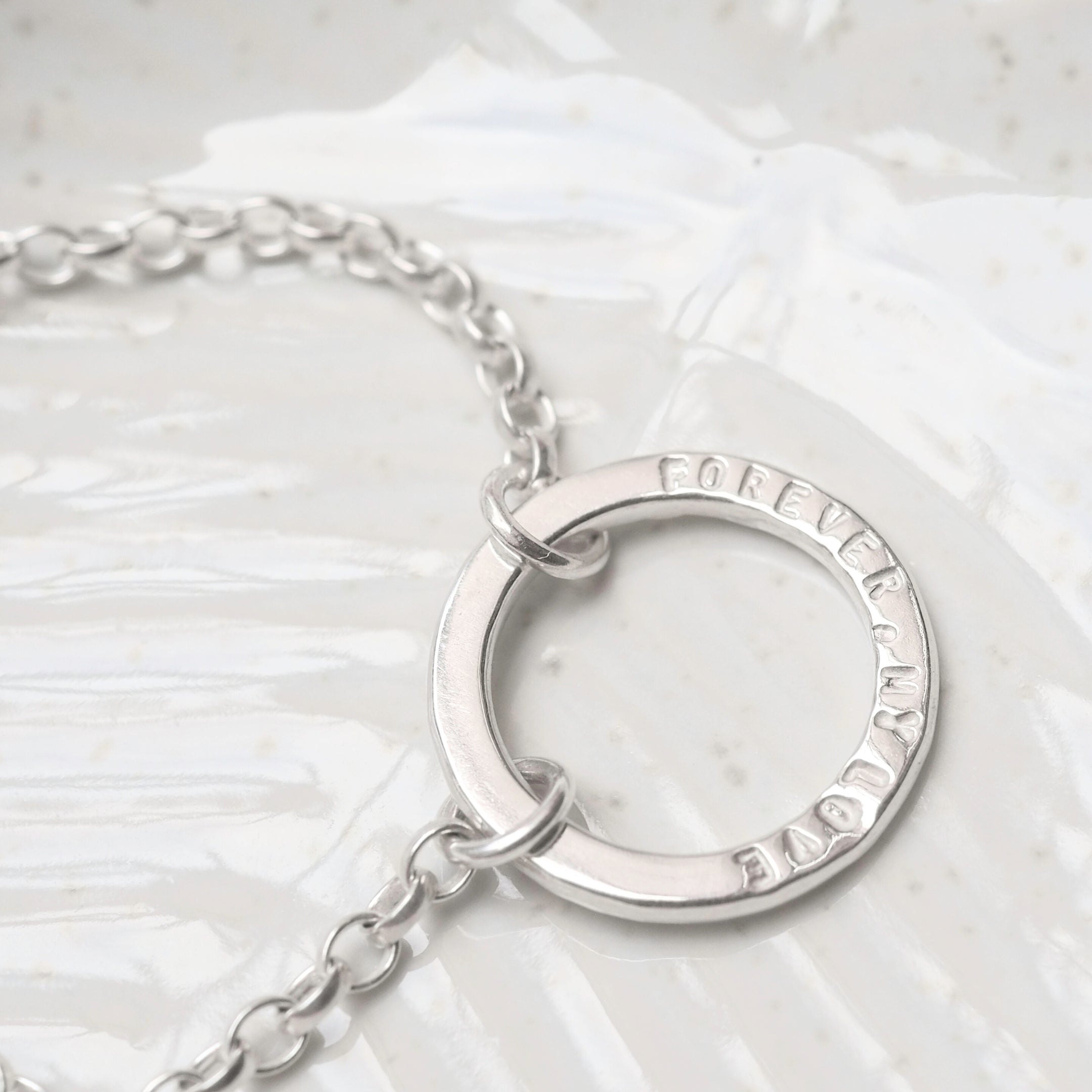 Personalised sterling silver jewellery with handstamped words