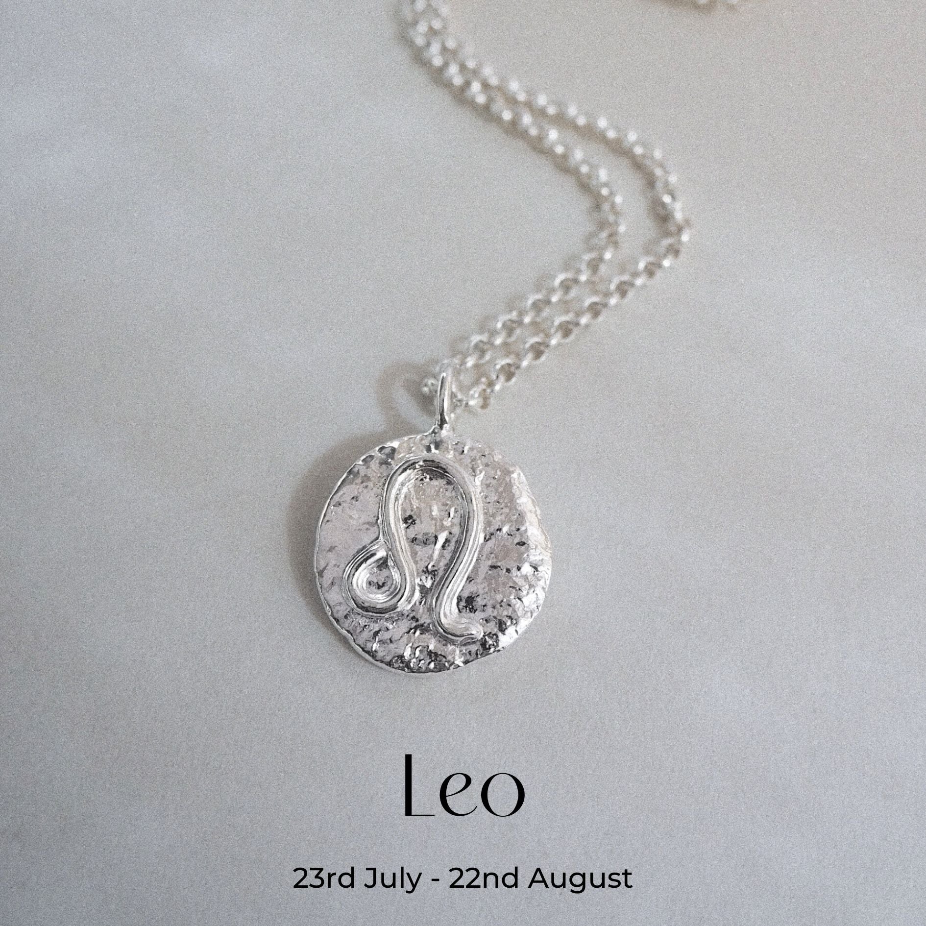 Hand-forged molten Leo Zodiac Necklace in Sterling Silver on a belcher chain