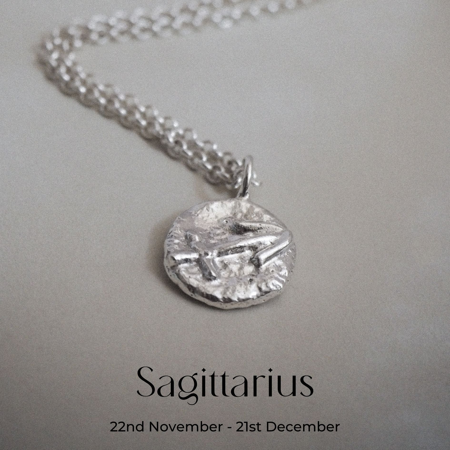 Hand-forged molten Sagittarius Necklace in Sterling Silver on a belcher chain
