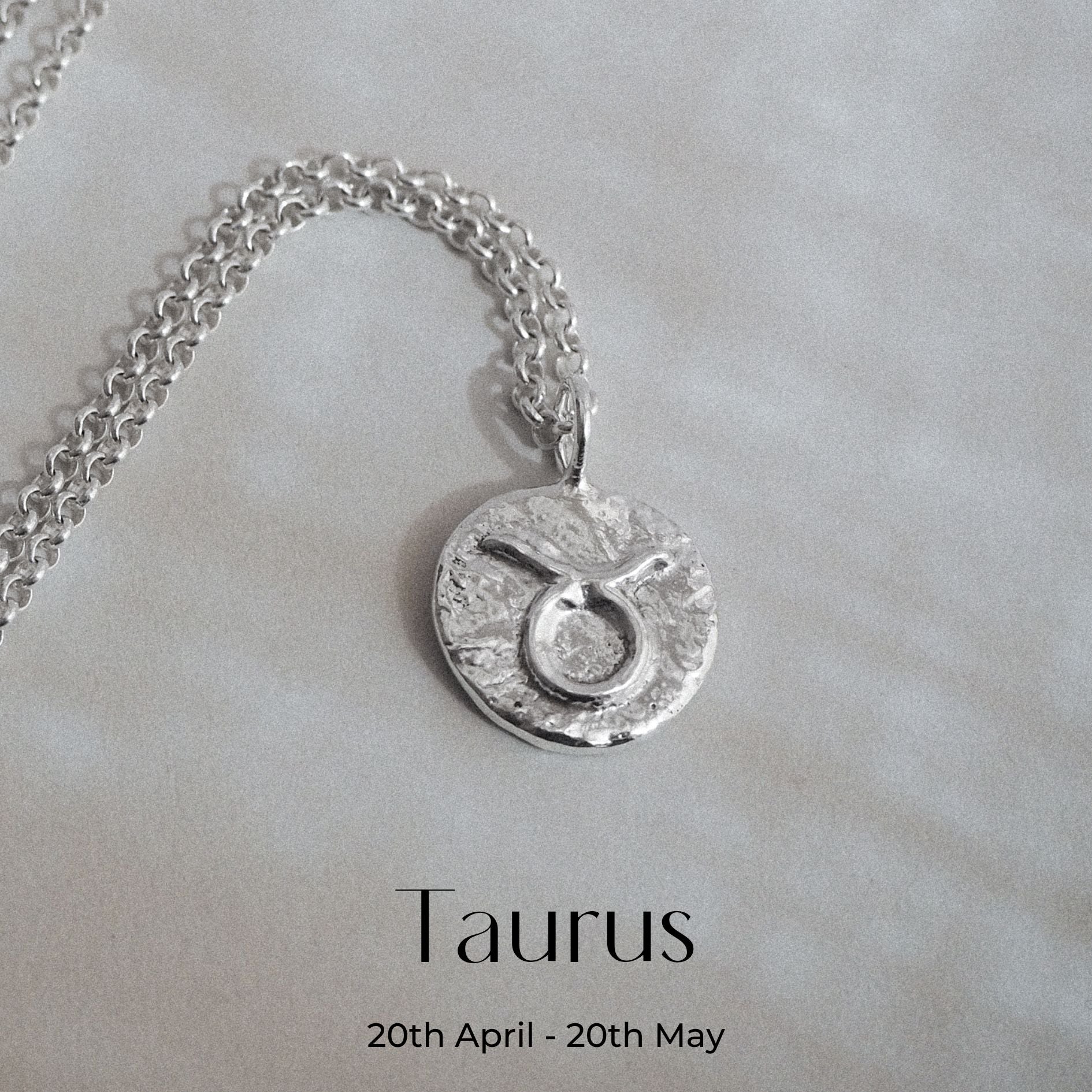 Hand-forged molten Taurus Necklace in Sterling Silver on a belcher chain