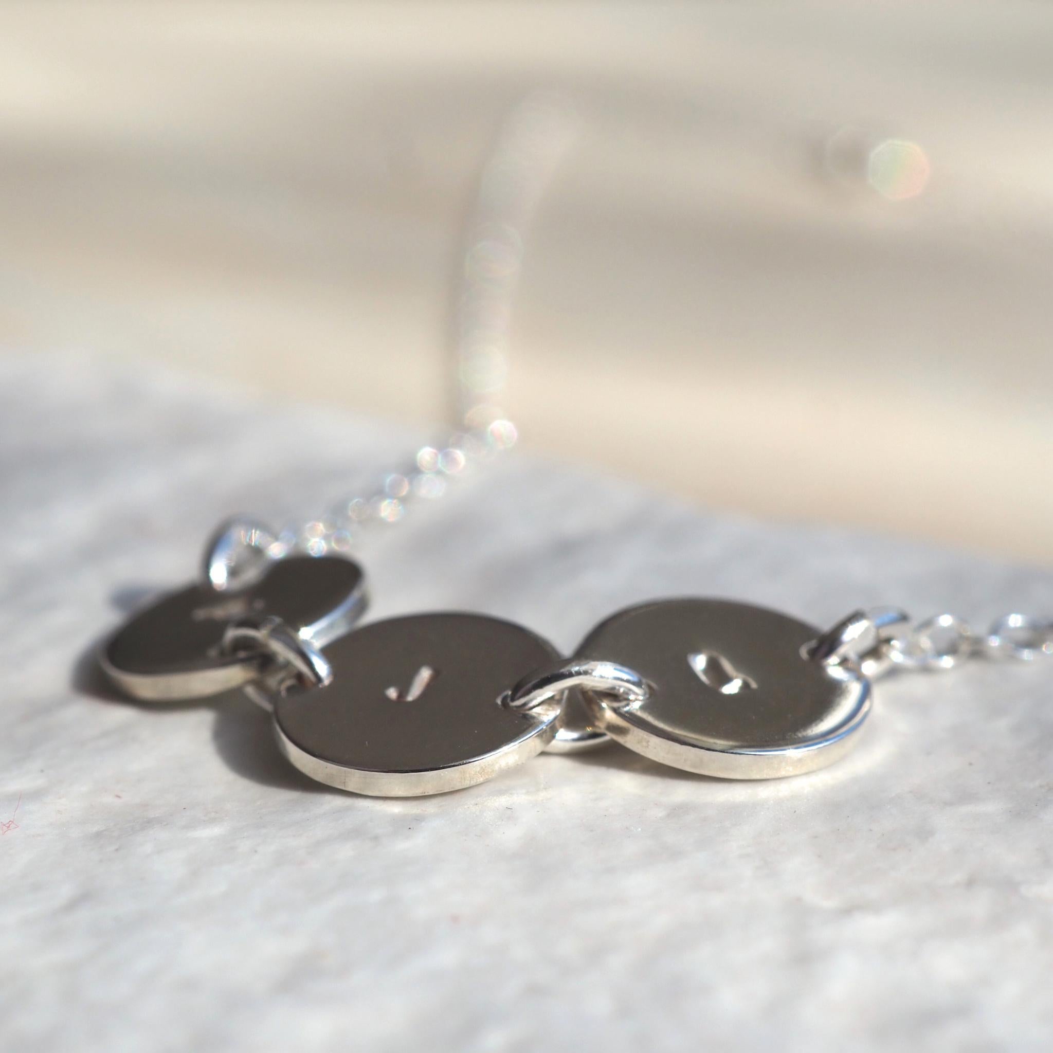 Hand-stamped joined initial disc necklace